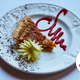 Slice of sugar pie on a decorative plate